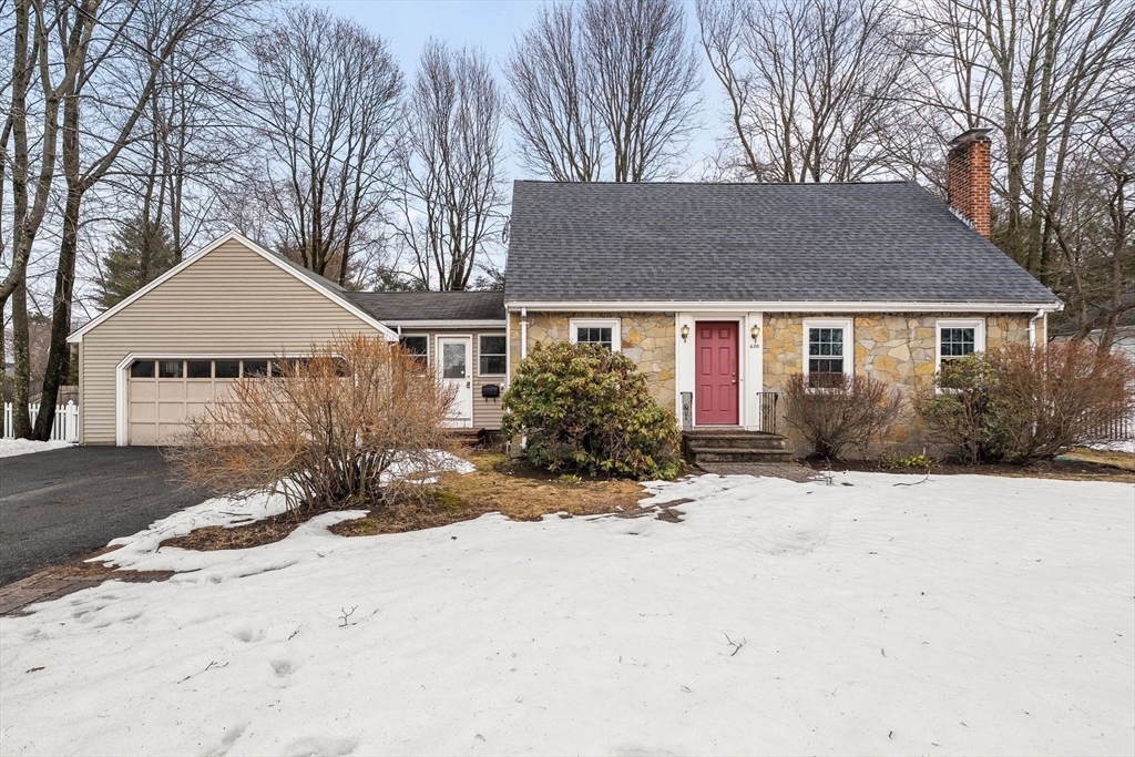 630 Pleasant Street Canton, MA 02021 - Photo 31 of 31 a front view of a house with a yard covered in snow