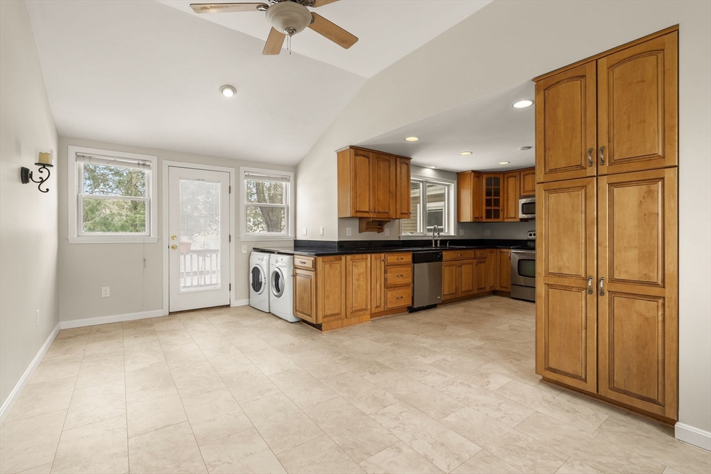 630 Pleasant Street Canton, MA 02021 - Photo 10 of 31 a view of a kitchen with a sink and cabinet