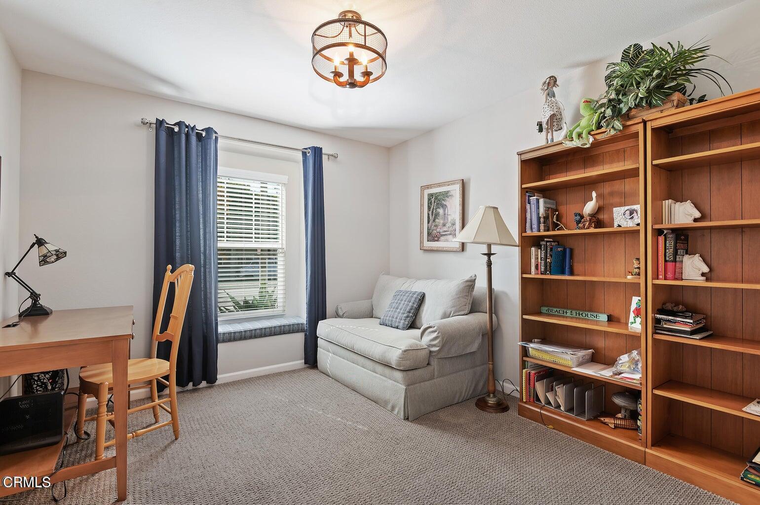3661 West Hemlock Street Oxnard, CA 93035 - Photo 14 of 21 a living room with furniture a piano and a window