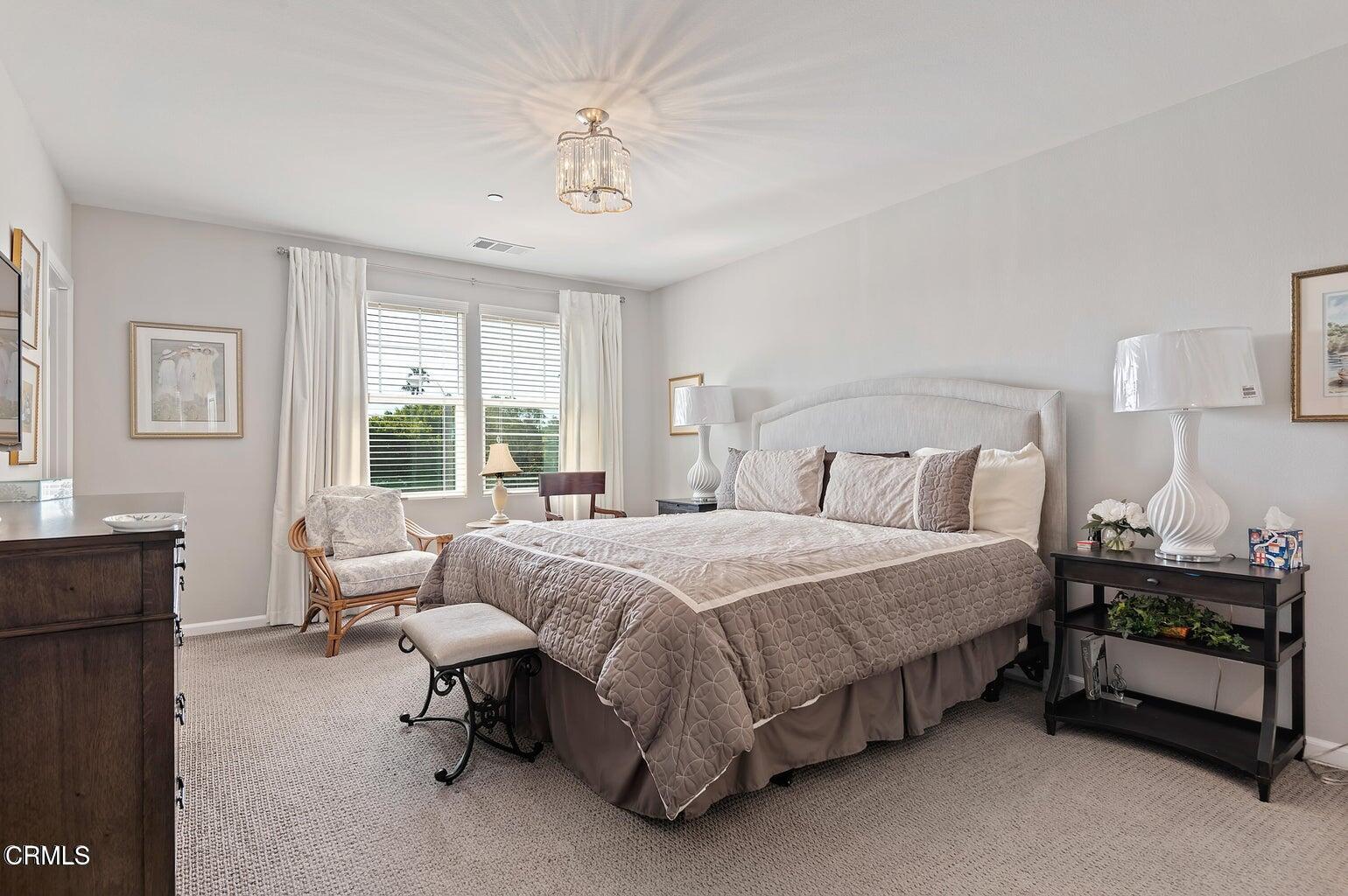 3661 West Hemlock Street Oxnard, CA 93035 - Photo 20 of 21 a bedroom with a bed and a window