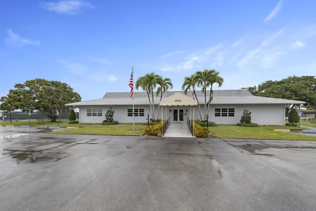 front view of a house with a big yard