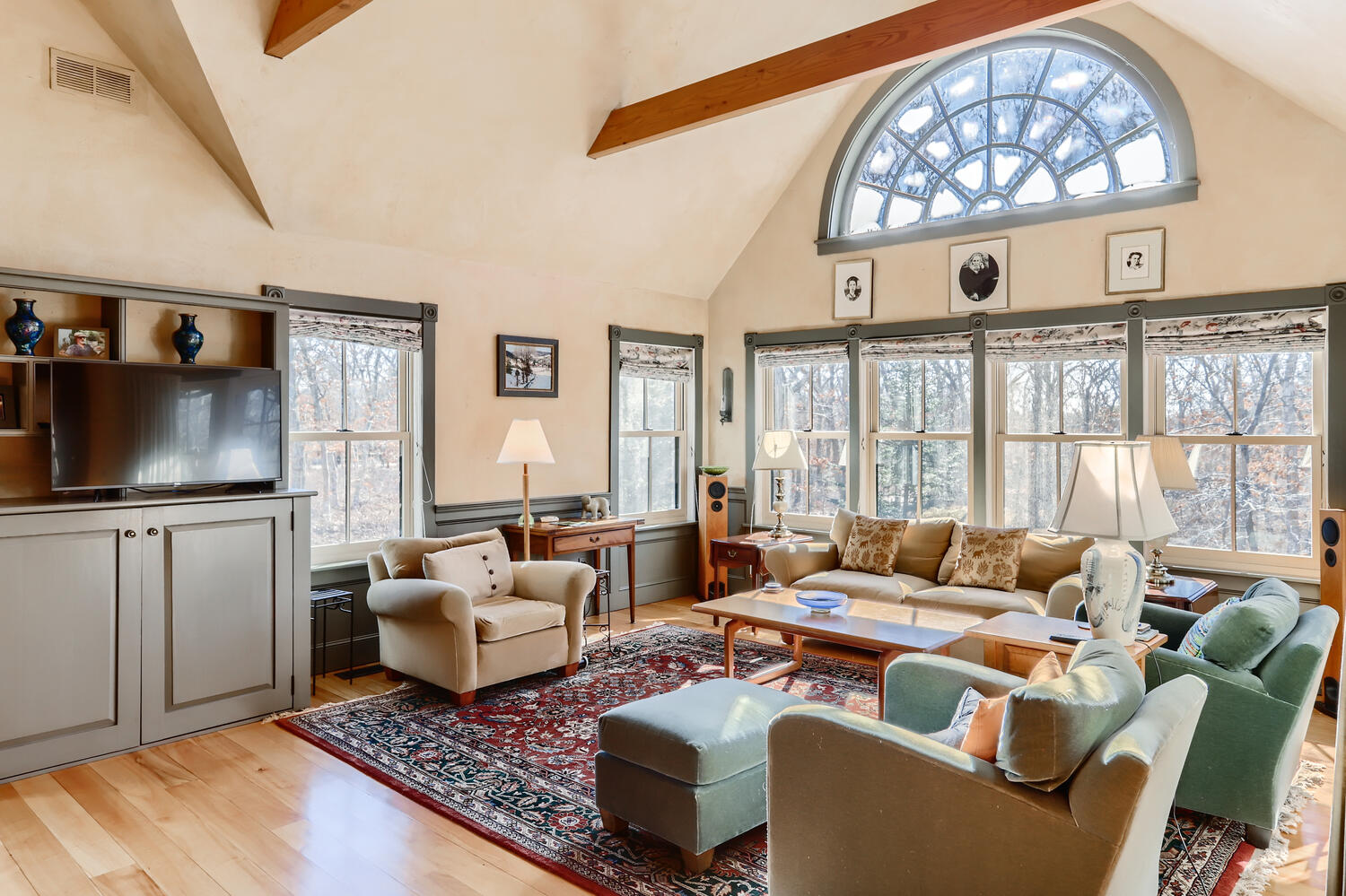 40 Bridle Path Road Vineyard Haven, MA 02568 - Photo 12 of 39 a living room with furniture a flat screen tv and a window
