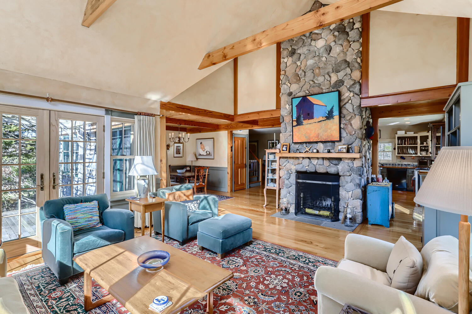 40 Bridle Path Road Vineyard Haven, MA 02568 - Photo 13 of 39 a living room with furniture fireplace and a large window