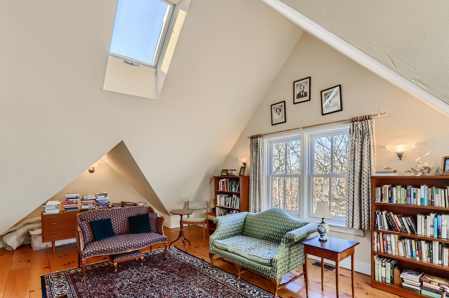 40 Bridle Path Road Vineyard Haven, MA 02568 - Photo 27 of 39 a living room with furniture and a book shelf