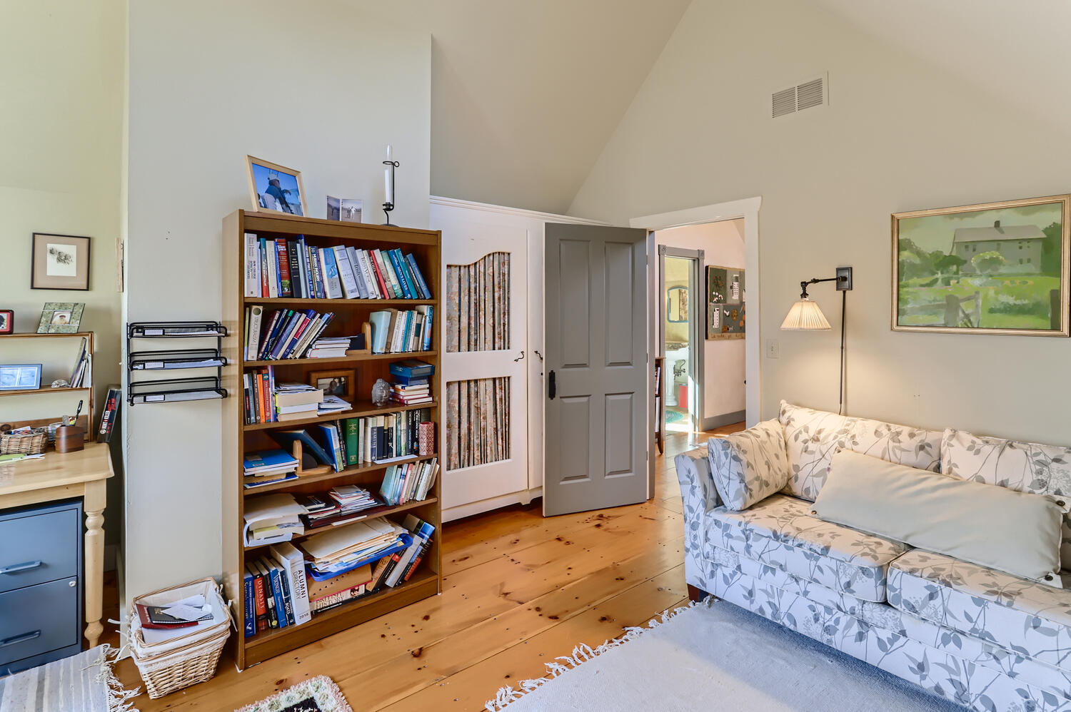 40 Bridle Path Road Vineyard Haven, MA 02568 - Photo 29 of 39 a living room with furniture and a book shelf