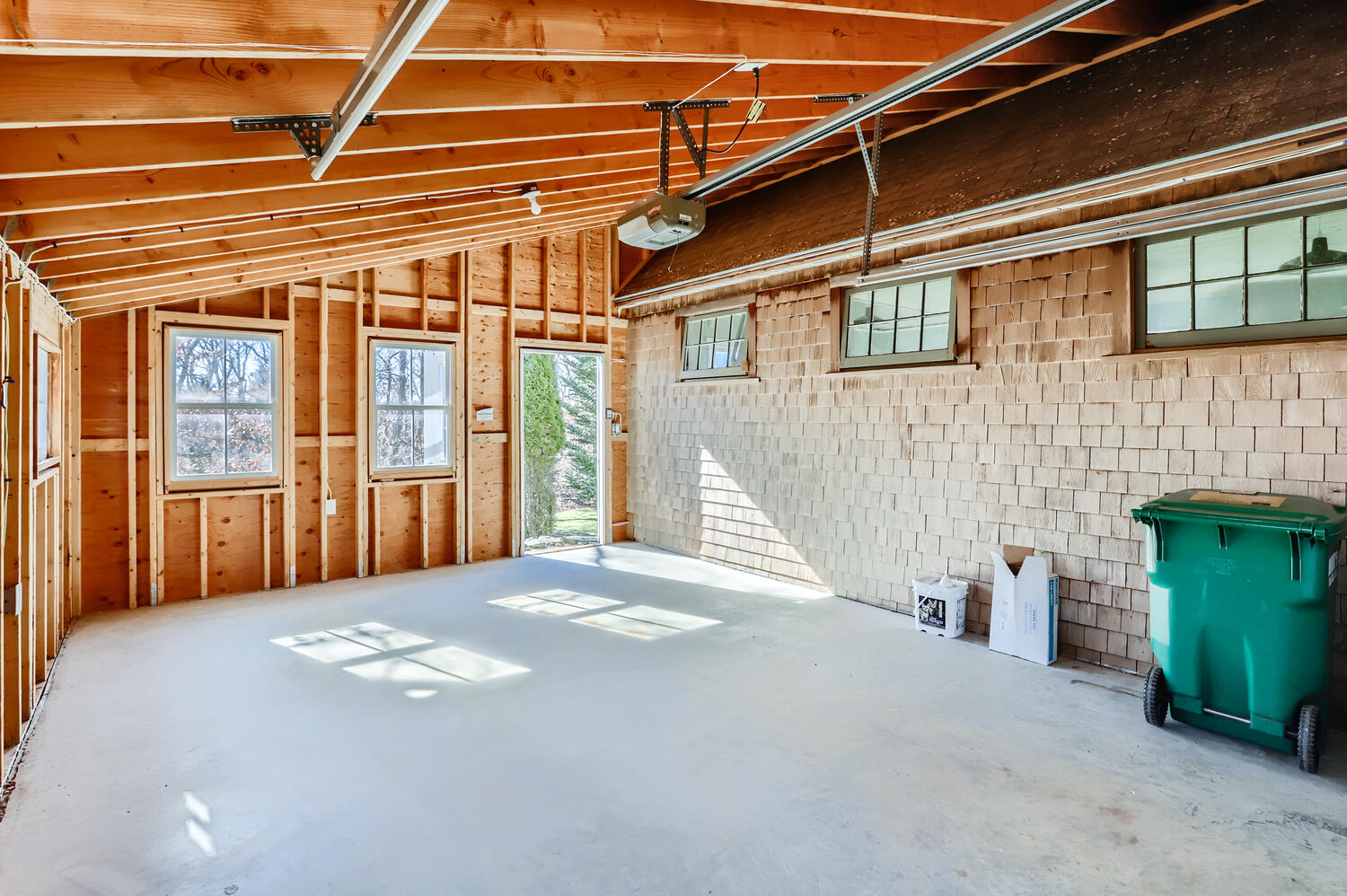 40 Bridle Path Road Vineyard Haven, MA 02568 - Photo 35 of 39 a front view of a house with a garage