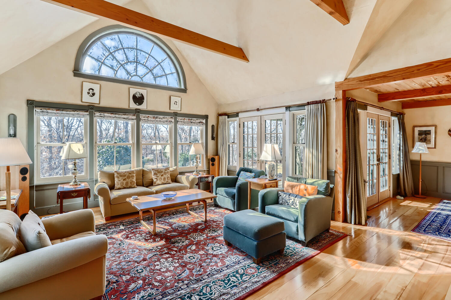 40 Bridle Path Road Vineyard Haven, MA 02568 - Photo 36 of 39 a living room with furniture large windows and wooden floor