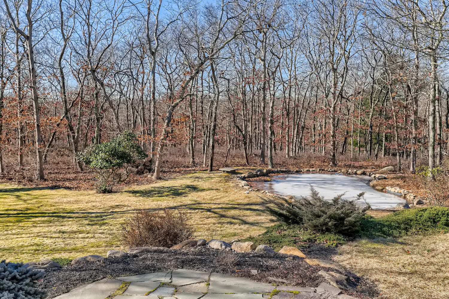 40 Bridle Path Road Vineyard Haven, MA 02568 - Photo 6 of 39 a view of a backyard with white house