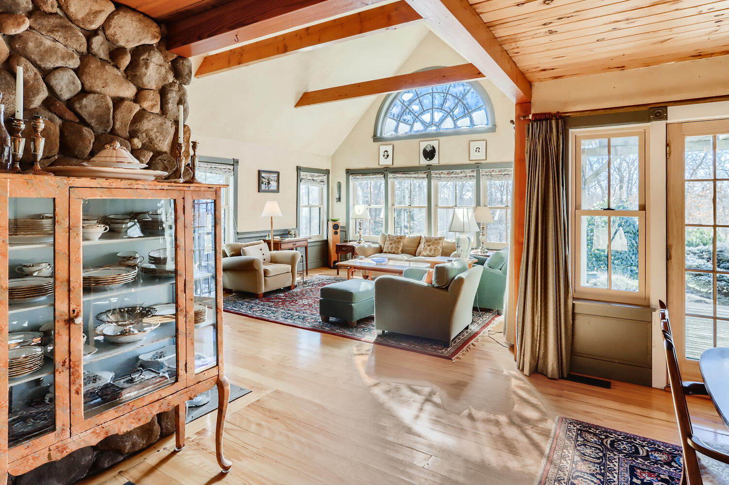 40 Bridle Path Road Vineyard Haven, MA 02568 - Photo 10 of 39 a large living room with stainless steel appliances wooden floor and a large window