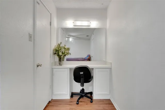 a view of entryway with wooden floor