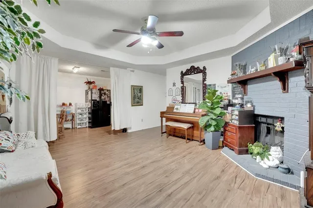 a bed room with furniture and a fireplace