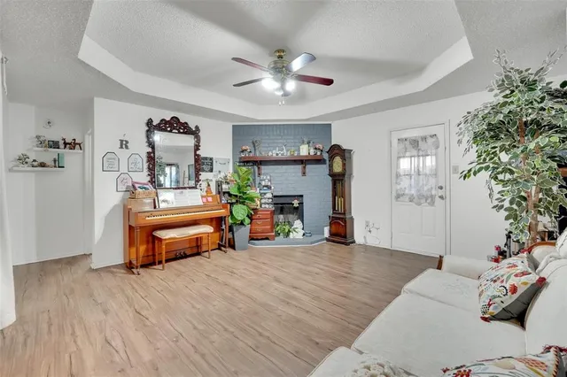 a bedroom with furniture and a chandelier
