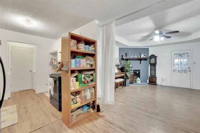 a view of a workspace with furniture and closet