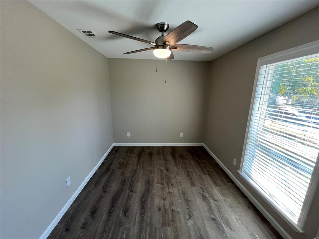 10037 Hymie Circle Dallas, TX 75217 - Photo 17 of 28 a view of wooden floor in a window