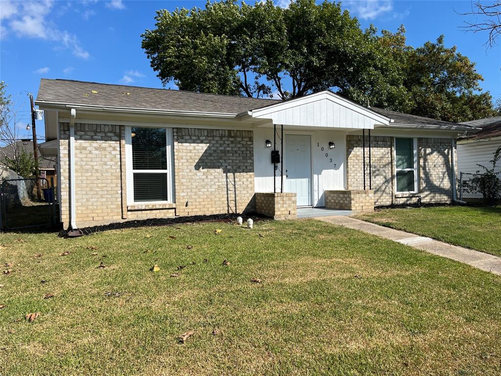 10037 Hymie Circle Dallas, TX 75217 - Photo 2 of 28 a house view with a garden space