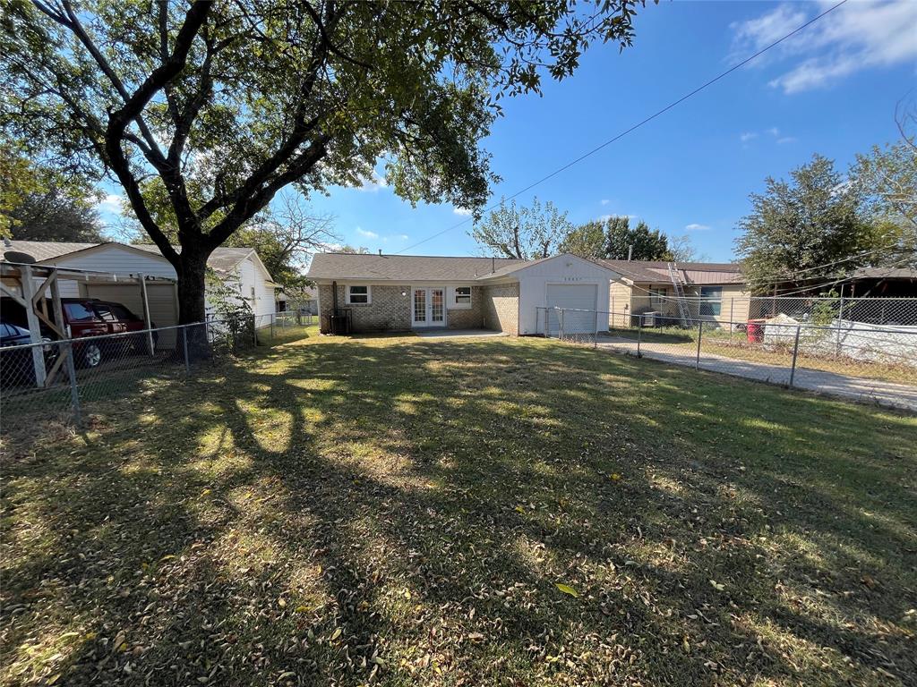 10037 Hymie Circle Dallas, TX 75217 - Photo 27 of 28 a house view with a sitting space and garden