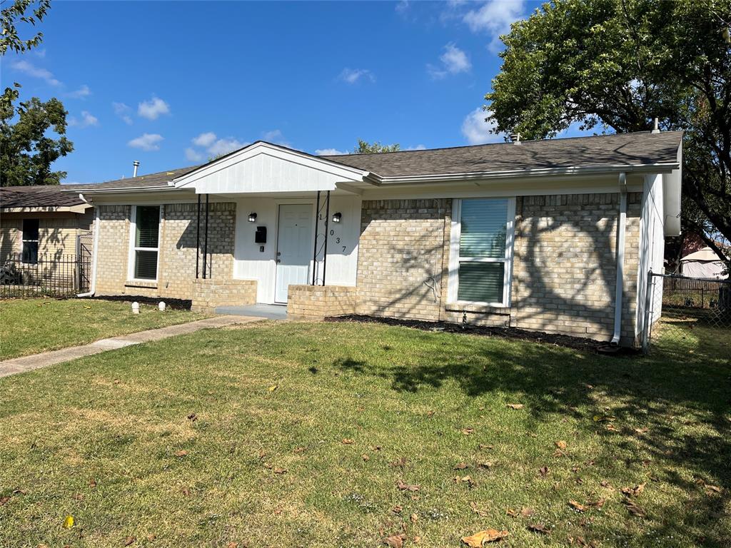 10037 Hymie Circle Dallas, TX 75217 - Photo 3 of 28 a front view of a house with garden