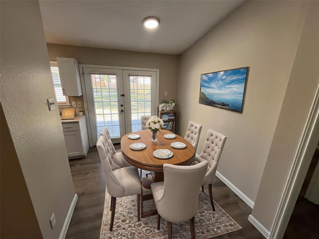 10037 Hymie Circle Dallas, TX 75217 - Photo 8 of 28 a view of a dining room with furniture window and wooden floor