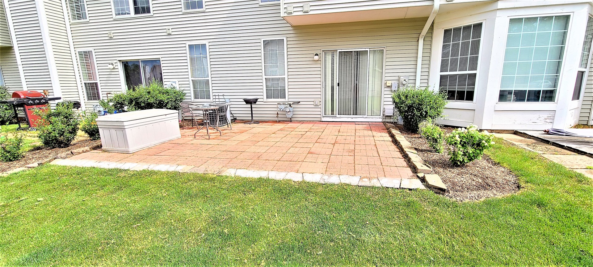 2203 Rossiter Parkway Plainfield, IL 60586 - Photo 3 of 24 a view of a house with backyard and sitting area