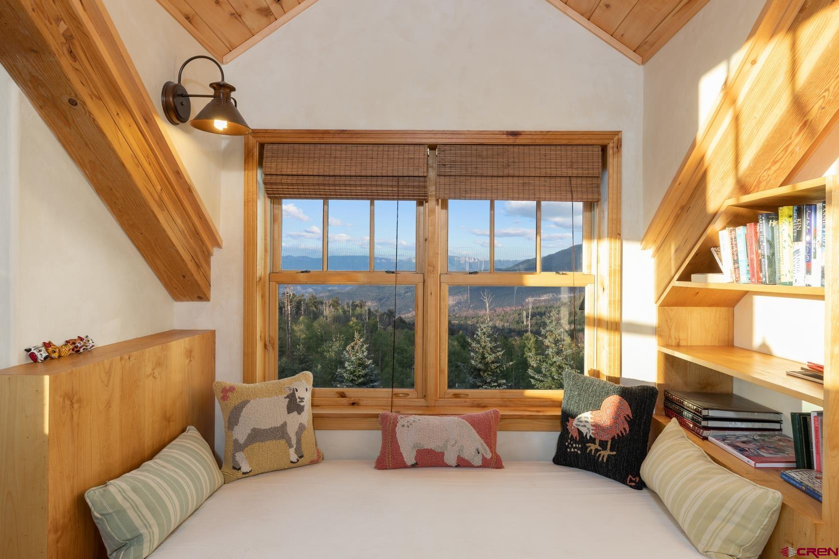 9706 County Road 5 Ridgway, CO 81432 - Photo 17 of 33 a living room with furniture and a window