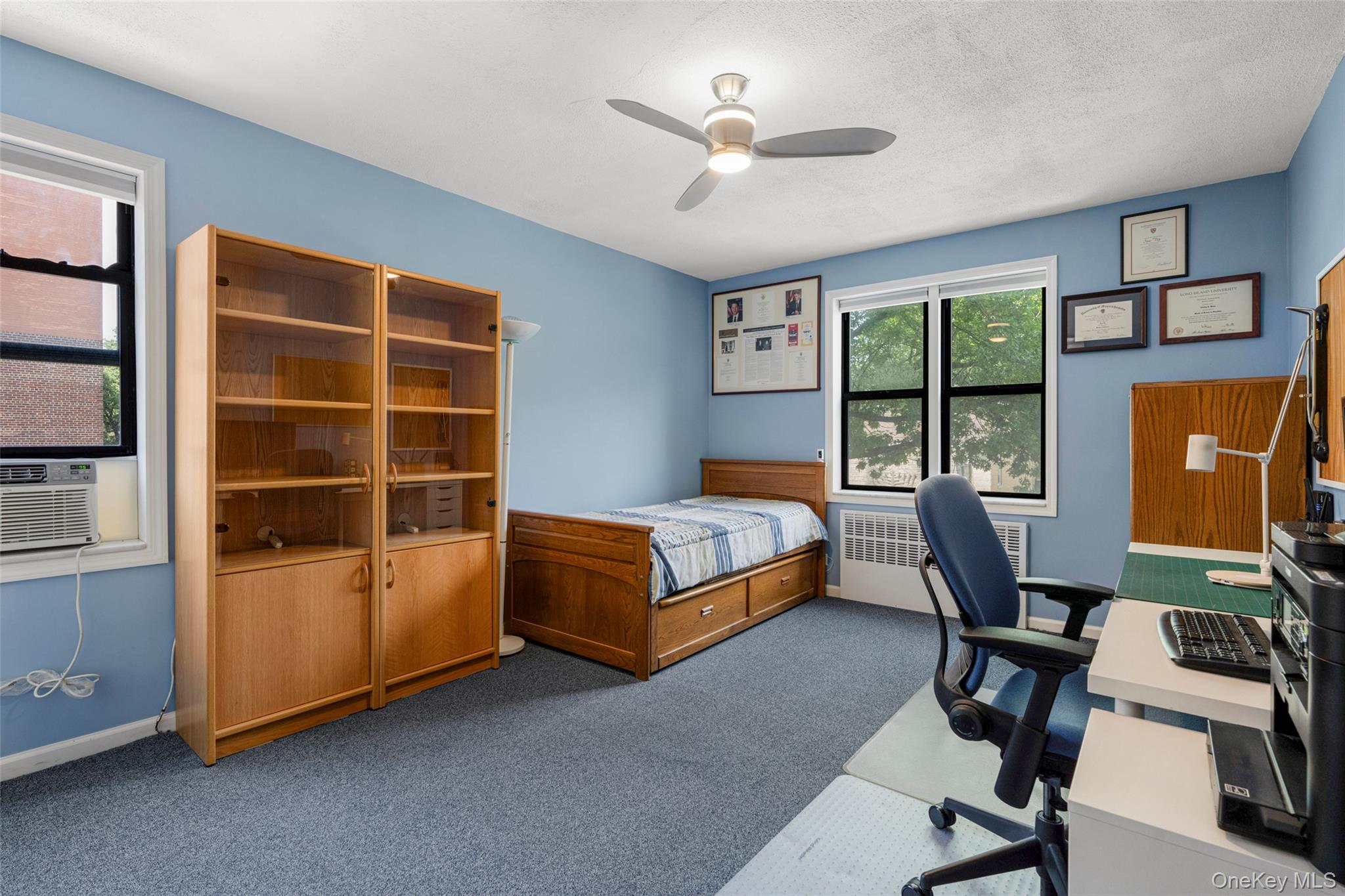 620 West 239th Street, Unit 2C Bronx, NY 10463 - Photo 13 of 19 a bedroom with furniture and a window