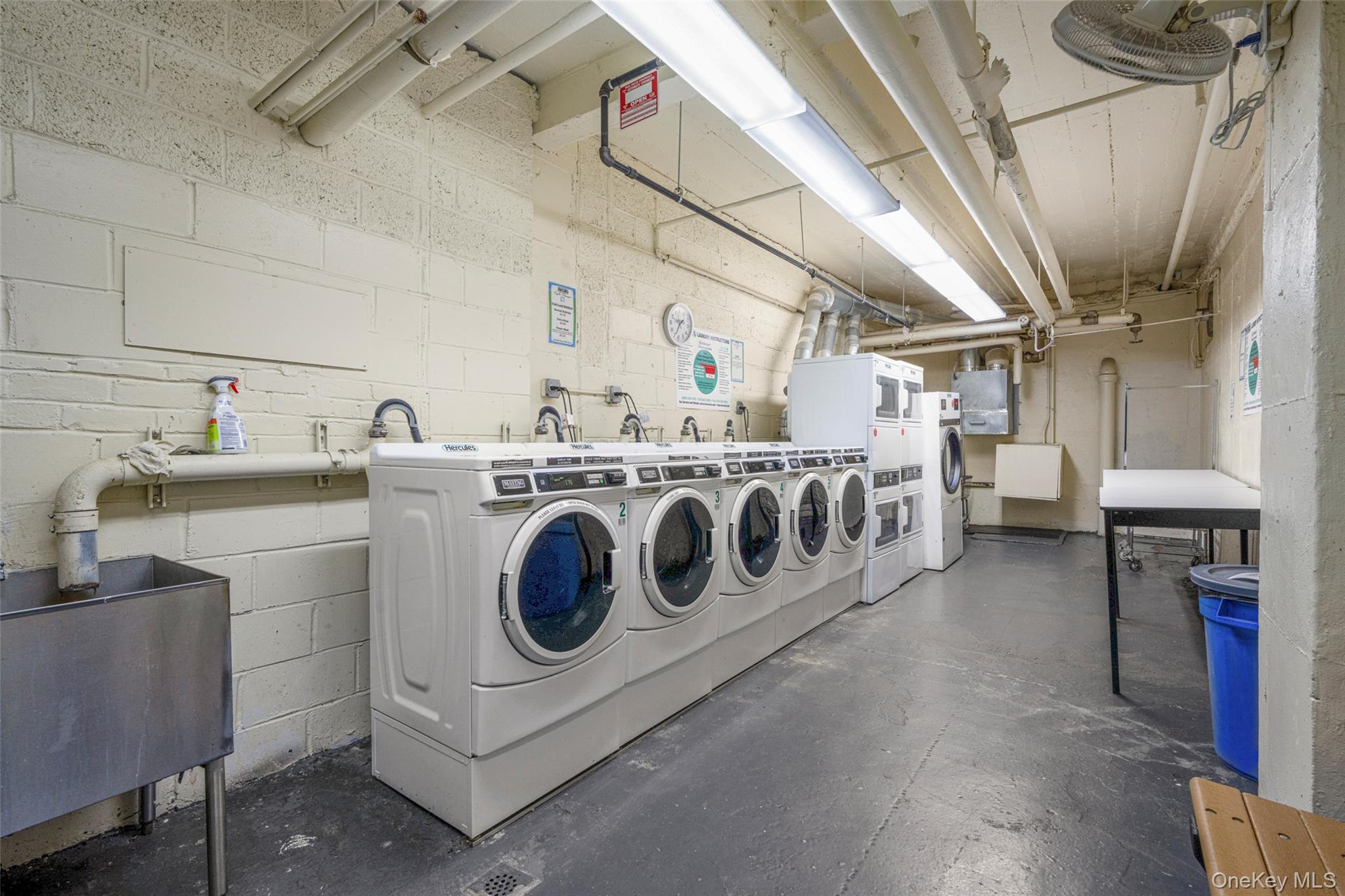 620 West 239th Street, Unit 2C Bronx, NY 10463 - Photo 16 of 19 a utility room with dryer and washer