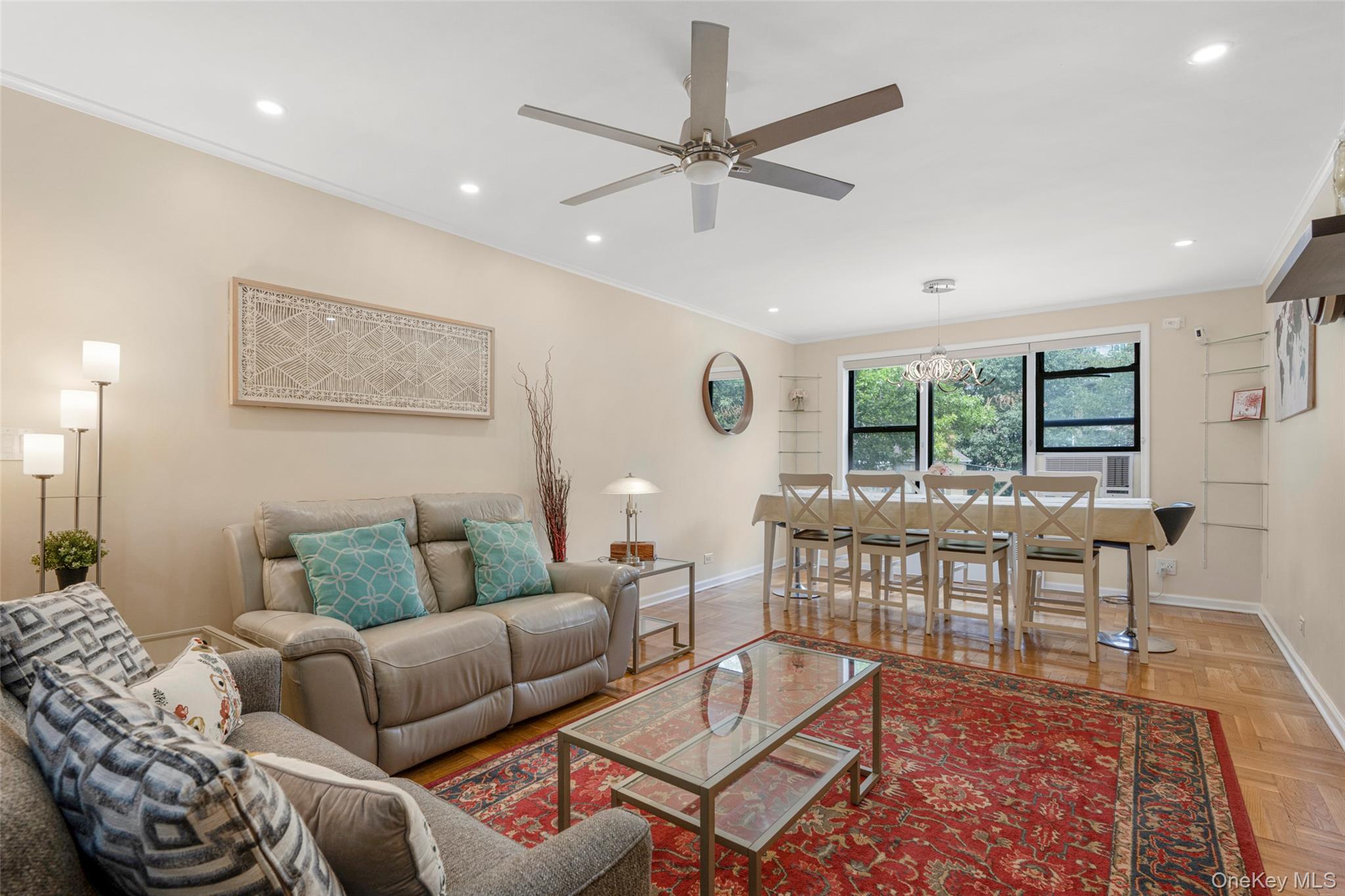 620 West 239th Street, Unit 2C Bronx, NY 10463 - Photo 6 of 19 a living room with furniture and a large window