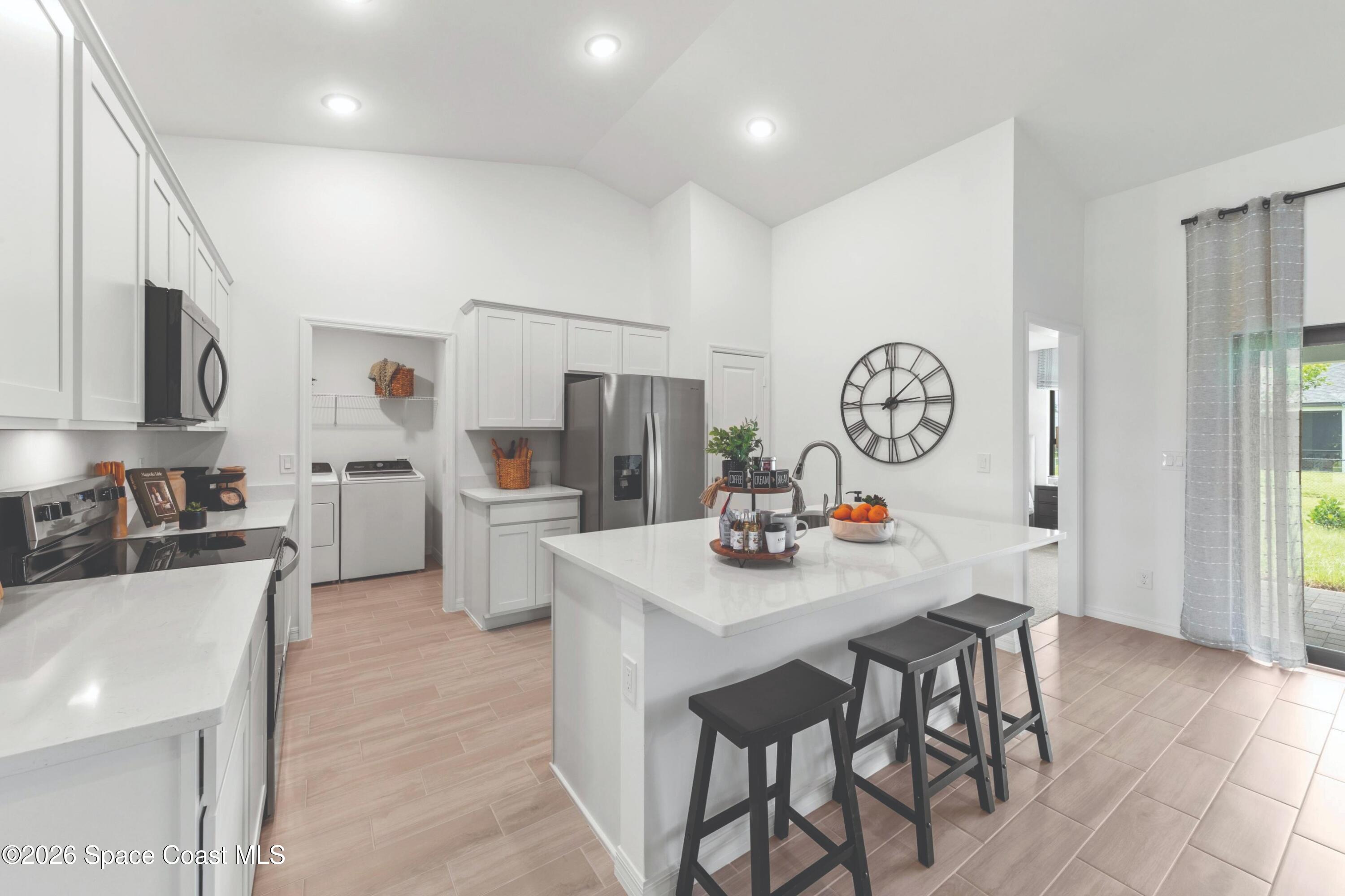 474 Halifax Street Southwest Palm Bay, FL 32908 - Photo 5 of 14 StAugustine_Kitchen_SPOT_CC_25SEP