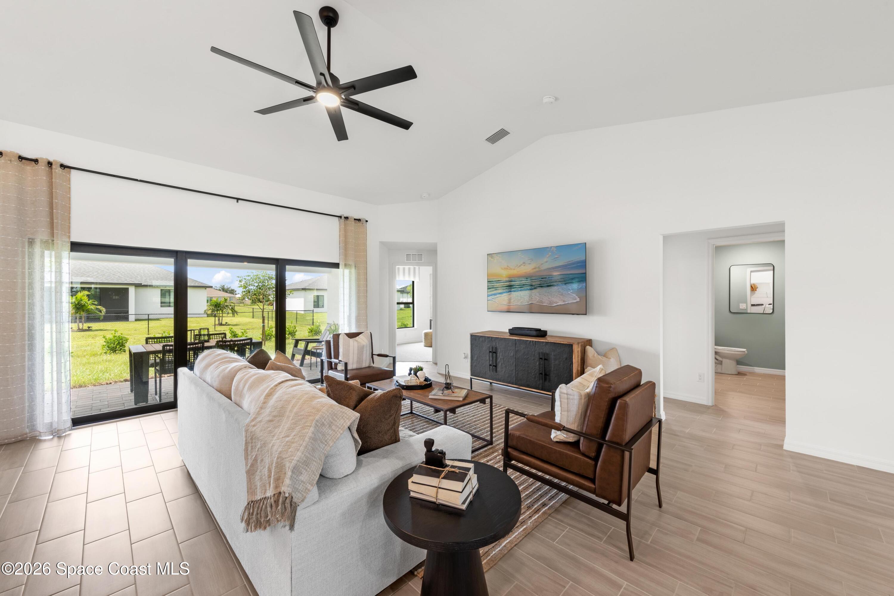 474 Halifax Street Southwest Palm Bay, FL 32908 - Photo 7 of 14 SL_STA_GreatRoom