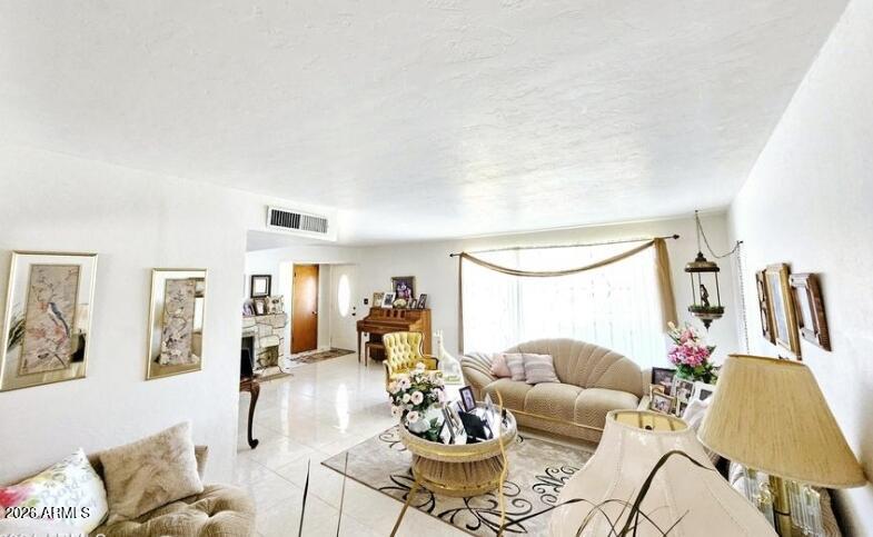2201 East 7th Street Douglas, AZ 85607 - Photo 12 of 49 a living room with furniture and a table