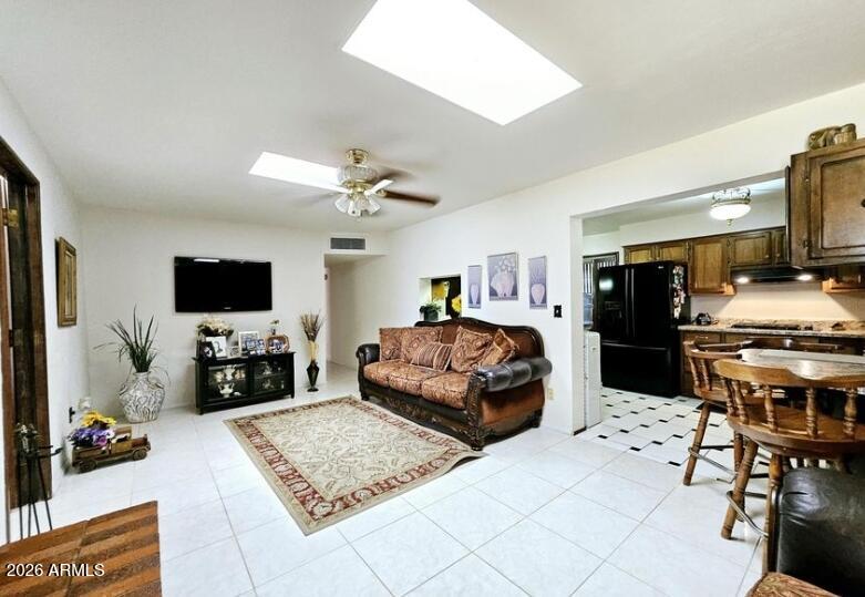 2201 East 7th Street Douglas, AZ 85607 - Photo 24 of 49 a living room with furniture and a flat screen tv
