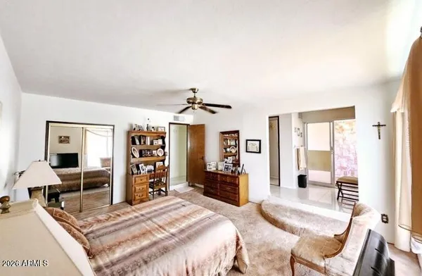 a view of a bathroom from a hallway