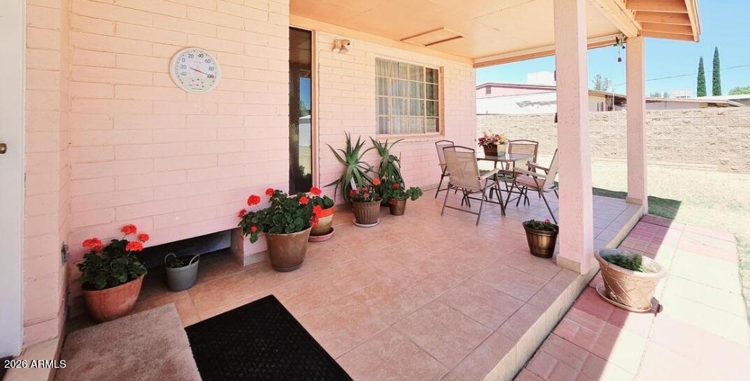 2201 East 7th Street Douglas, AZ 85607 - Photo 44 of 49 a view of balcony with chairs and potted plants