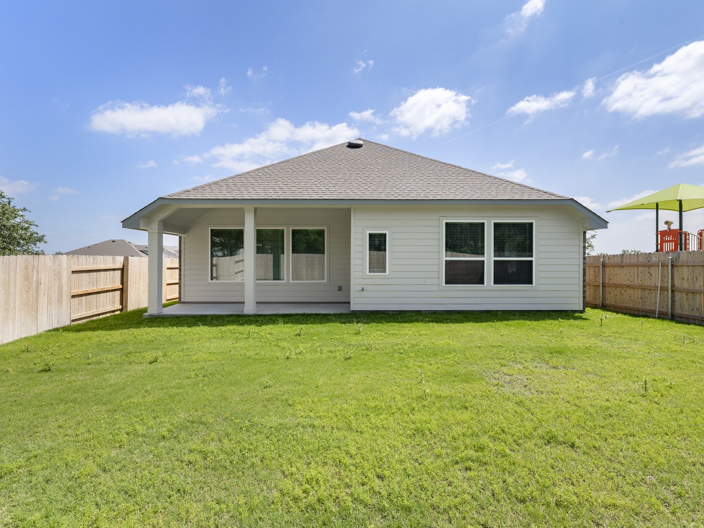 402 Judson Street Bertram, TX 78605 - Photo 22 of 27 a view of a house with backyard