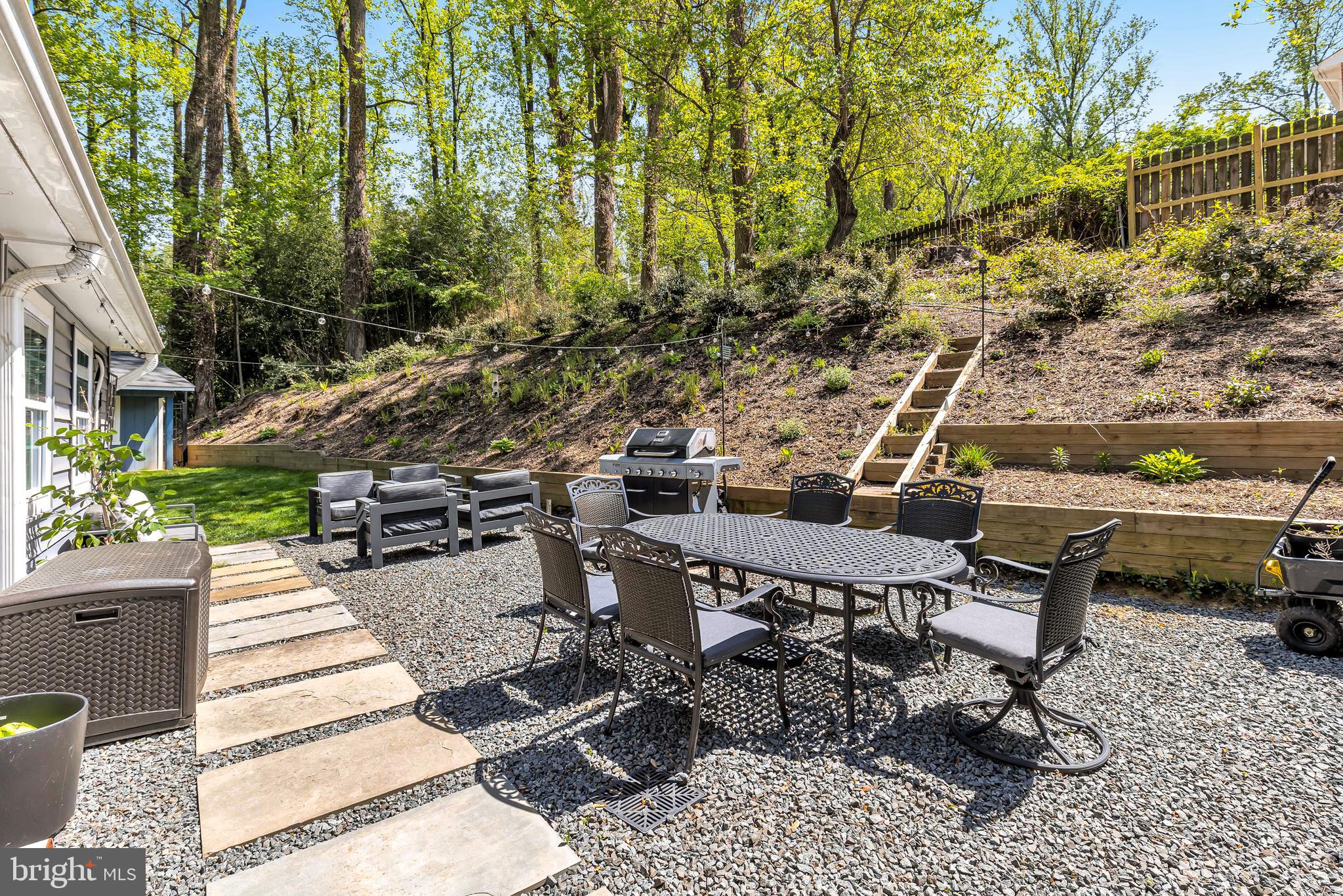 2863 Graham Road Falls Church, VA 22042 - Photo 32 of 35 Patio with hillside plantings for privacy
