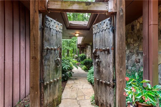 a view of a park with large trees