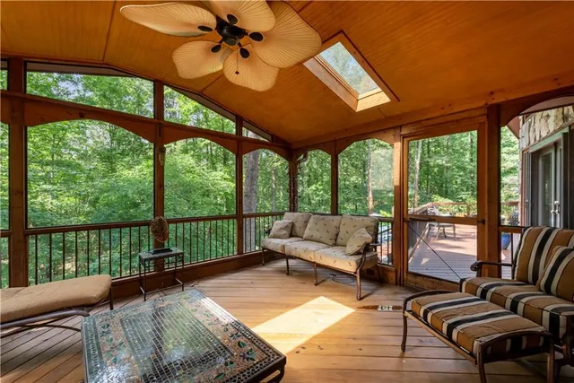 a view of a balcony with chairs