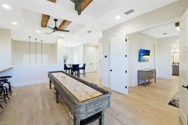 a living room with furniture and a table