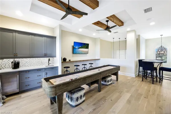 a room with furniture and wooden floor
