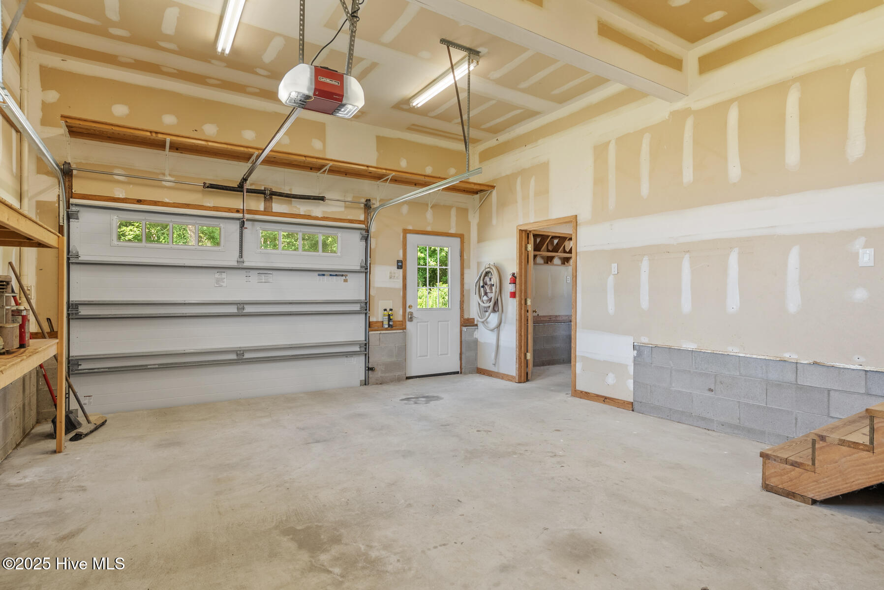 104 Perry's Way Grandy, NC 27965 - Photo 39 of 61 104 Perrys Way garage view toward door w