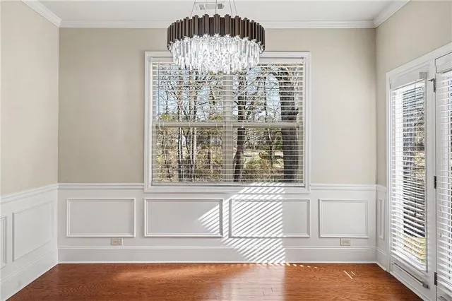 a view of an empty room with windows