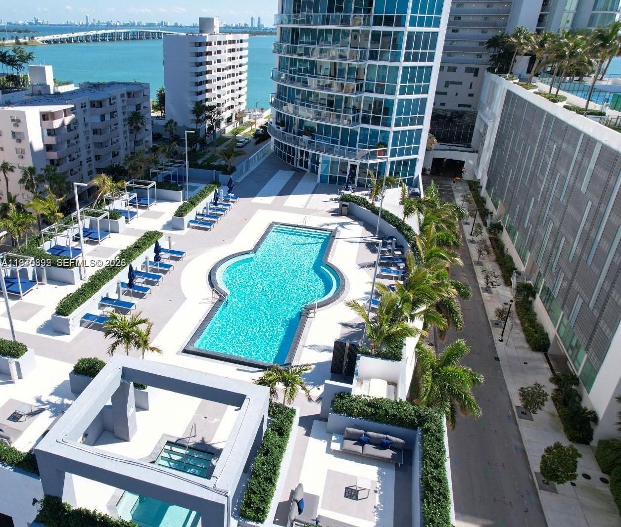 480 Northeast 30th Street, Unit 1403 Miami, FL 33137 - Photo 21 of 30 a view of a house with a yard