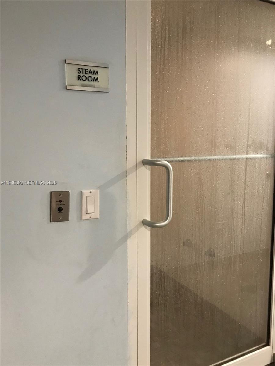 480 Northeast 30th Street, Unit 1403 Miami, FL 33137 - Photo 26 of 30 a bathroom with a shower