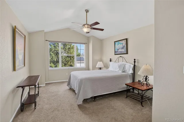 a bedroom with a bed furniture and a window