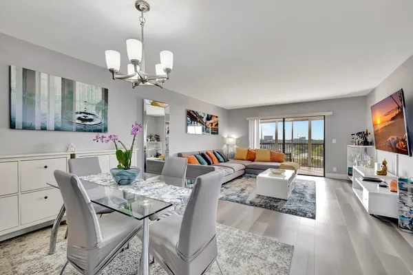 a living room with furniture and a rug