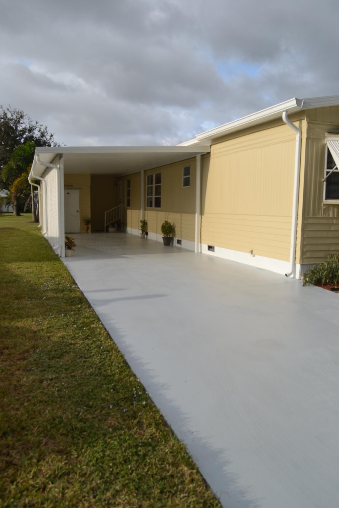 8355 East Club Road Boca Raton, FL 33433 - Photo 22 of 30 Carport & Side View