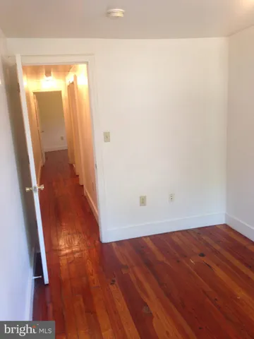 a bathroom with a shower a toilet and sink