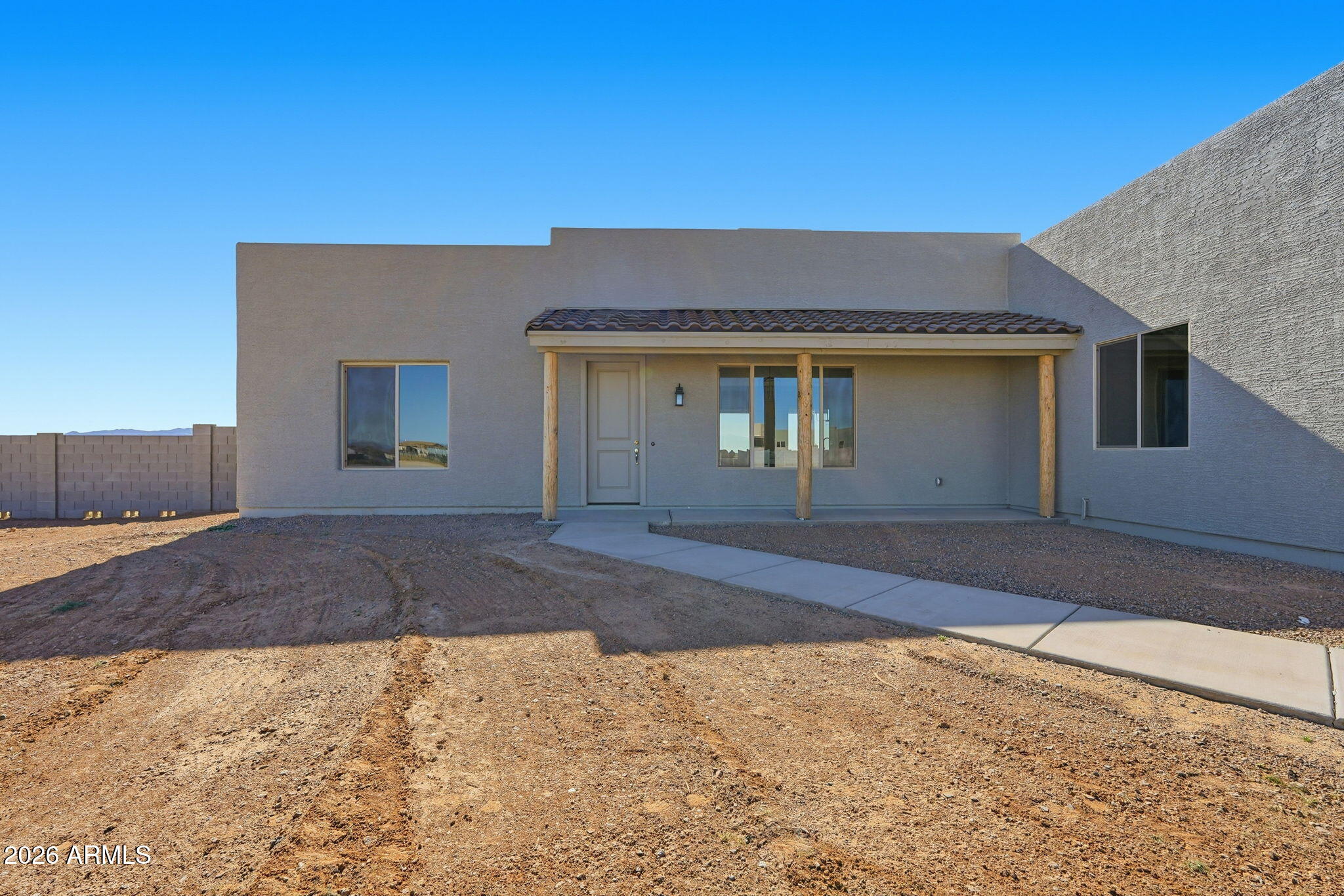 23131 West Skinner Road Wittmann, AZ 85361 - Photo 16 of 48 a front view of a house