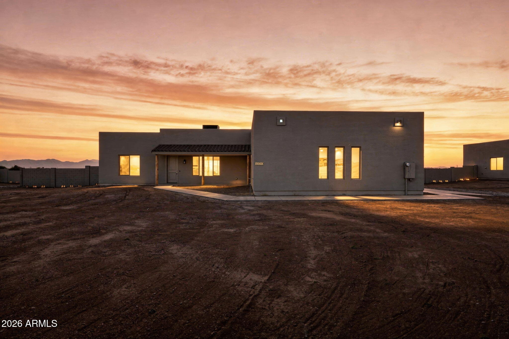 23131 West Skinner Road Wittmann, AZ 85361 - Photo 2 of 48 a view of a house with a yard