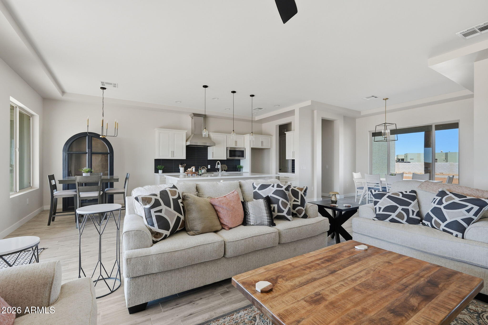 23131 West Skinner Road Wittmann, AZ 85361 - Photo 21 of 48 a living room with furniture or couch and a wooden floor